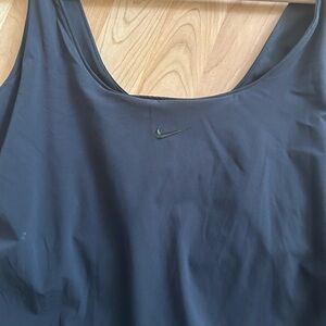 Nike tennis dress with built in shorts. Size medium